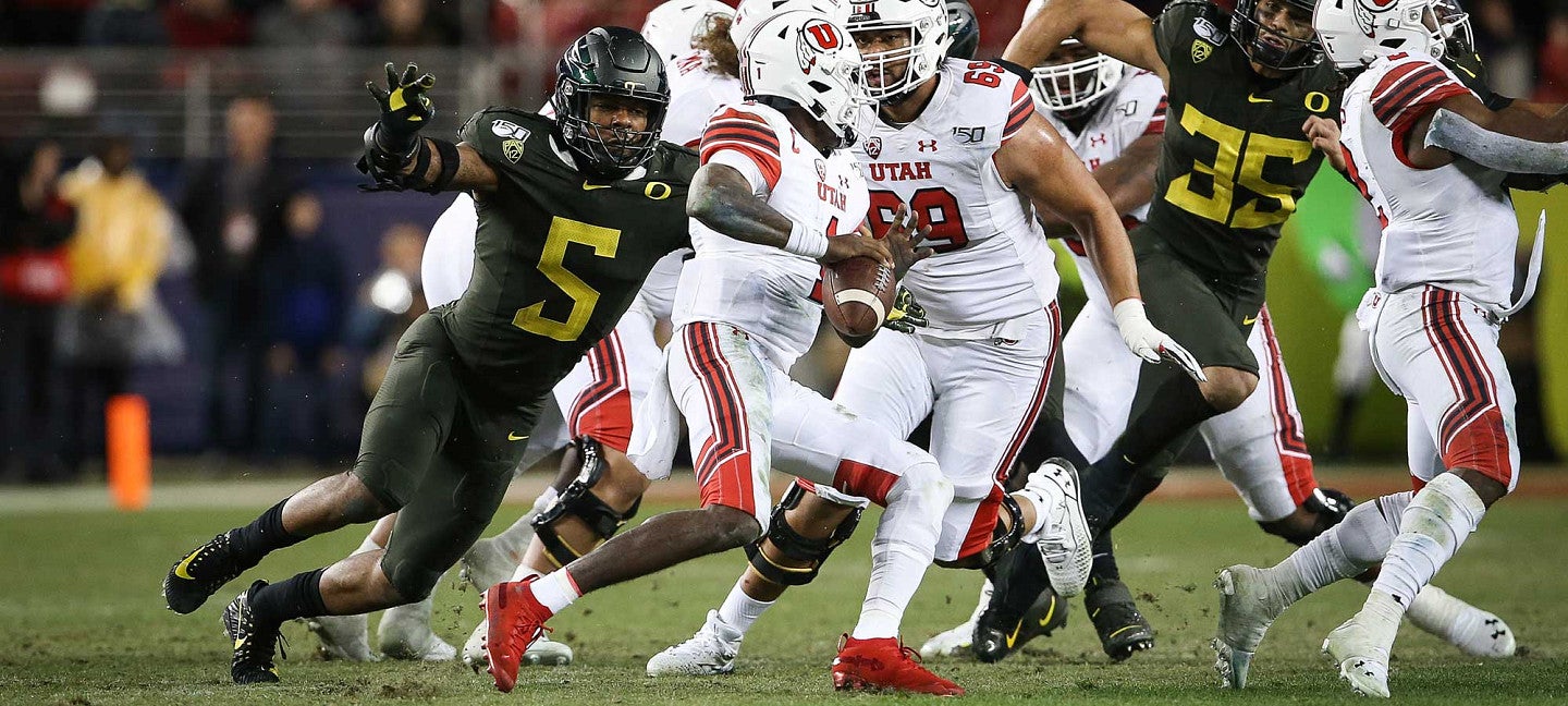 Kayvon Thibodeaux sacking Utah quarterback Tyler Huntley in the Pac-12 Championship Game