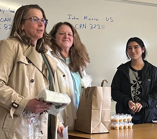 From left: interim UO President Jamie Moffitt, acting Provost Janet Woodruff-Borden and Luda Isakharov