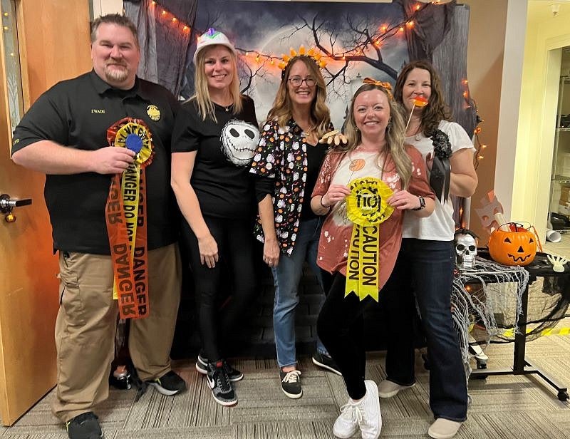 Spooky Treats competition winners holding ribbons