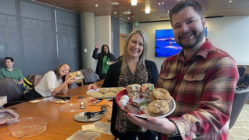 Communications staff sharing cookie exchange creations