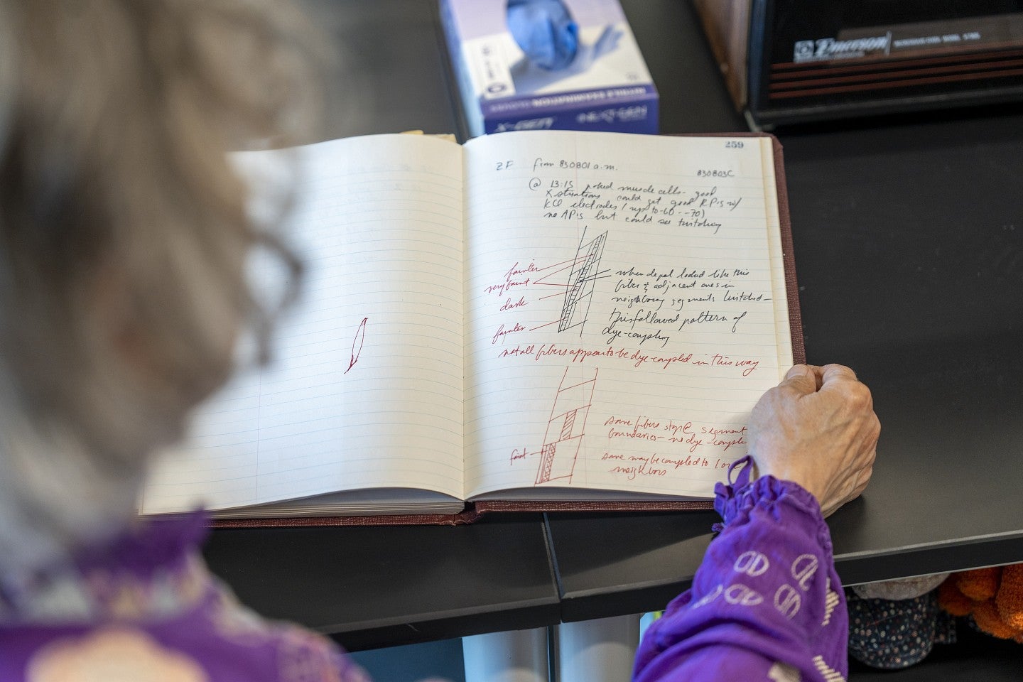 Judith Eisen examining lab notes