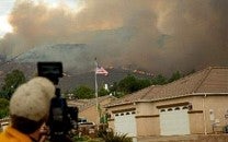 documentary filmmaker Trip Jennings capturing wildfire footage