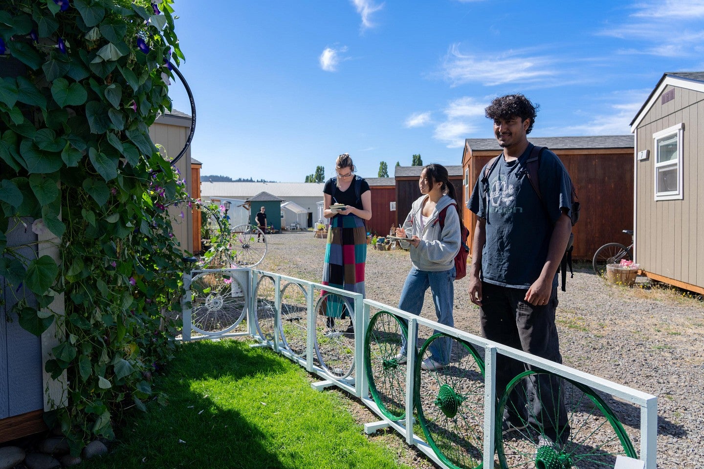 Students looking at a home in "Everyone's village" during the Bruton Design Intensive