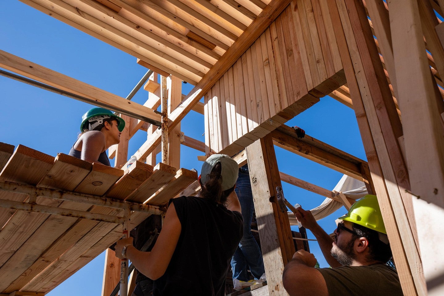 Students doing construction work during the Bruton Design Intensive