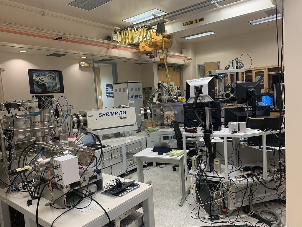 A research lab filled with various instruments and computer monitors sitting on tables to help date crystals found in lava flows to estimate when South Sister had erupted in the past.