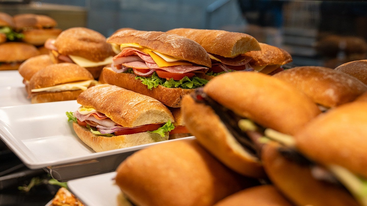 Sandwiches on trays awaiting diners