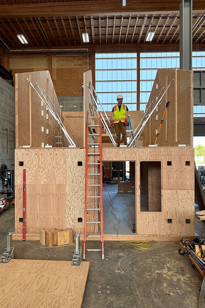 a mass plywood house prototype under construction