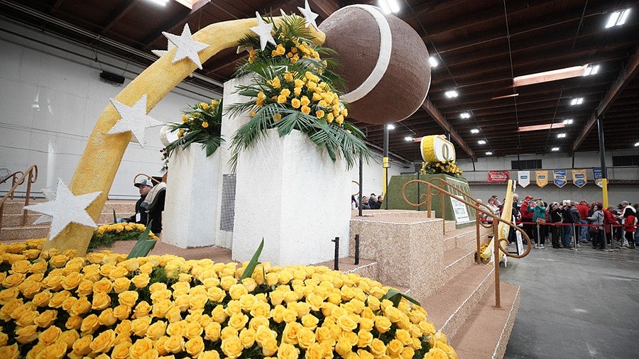 Rose Bowl parade float with yellow roses