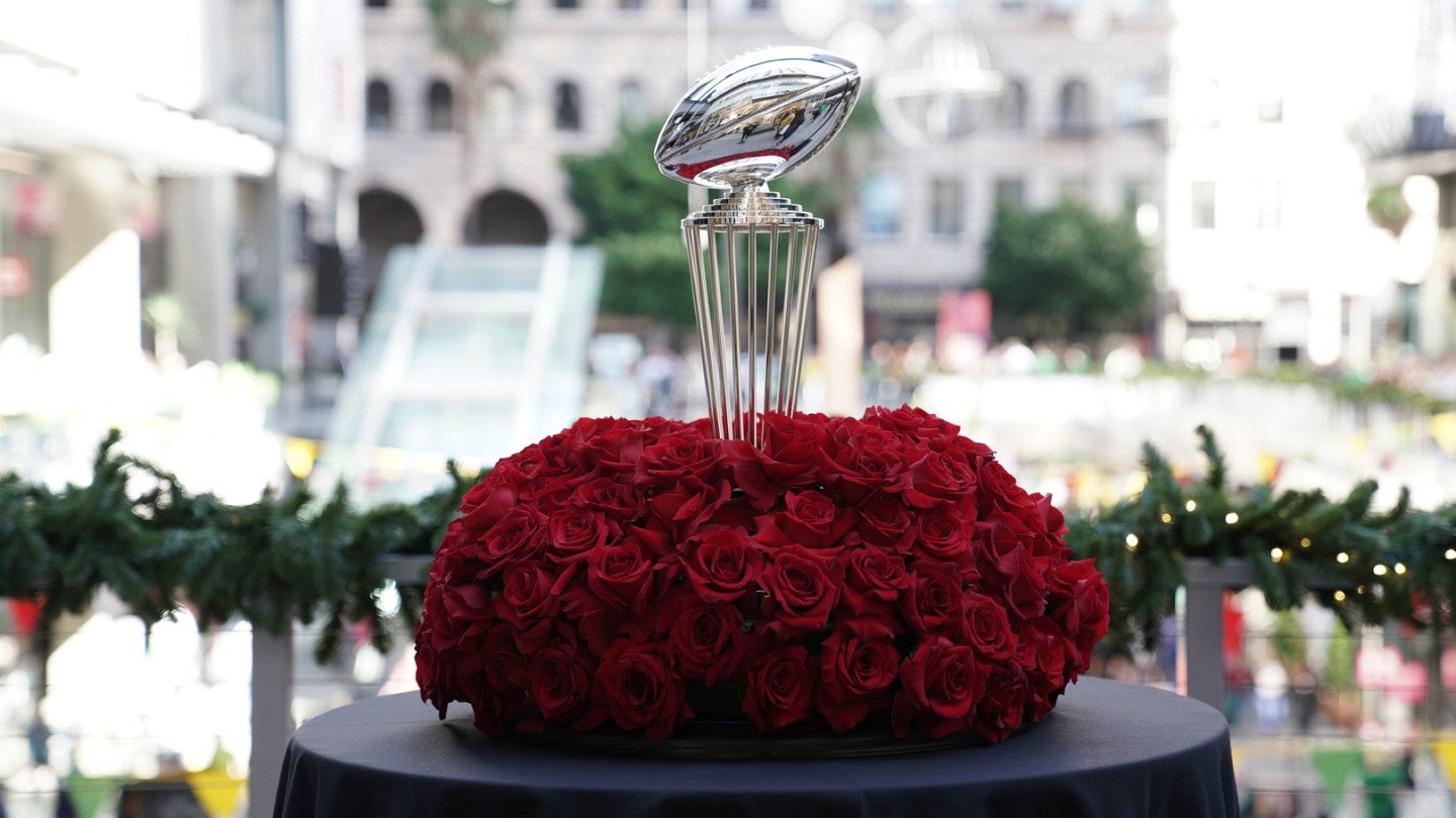 Rose Bowl trophy on top of roses