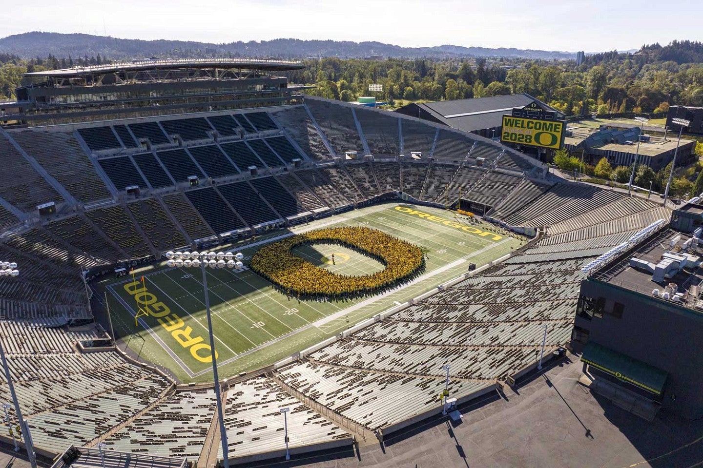 arial view of the class of 2028 forming an O in the middle of Autzen Stadium