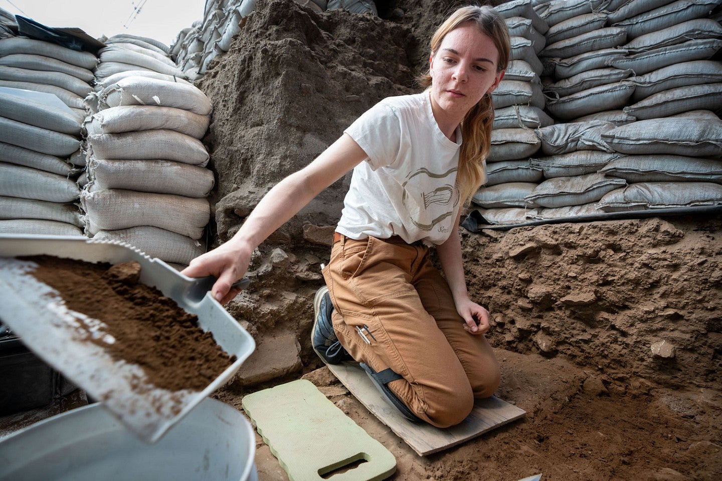 Gabi Gauthier working at an archaeological site