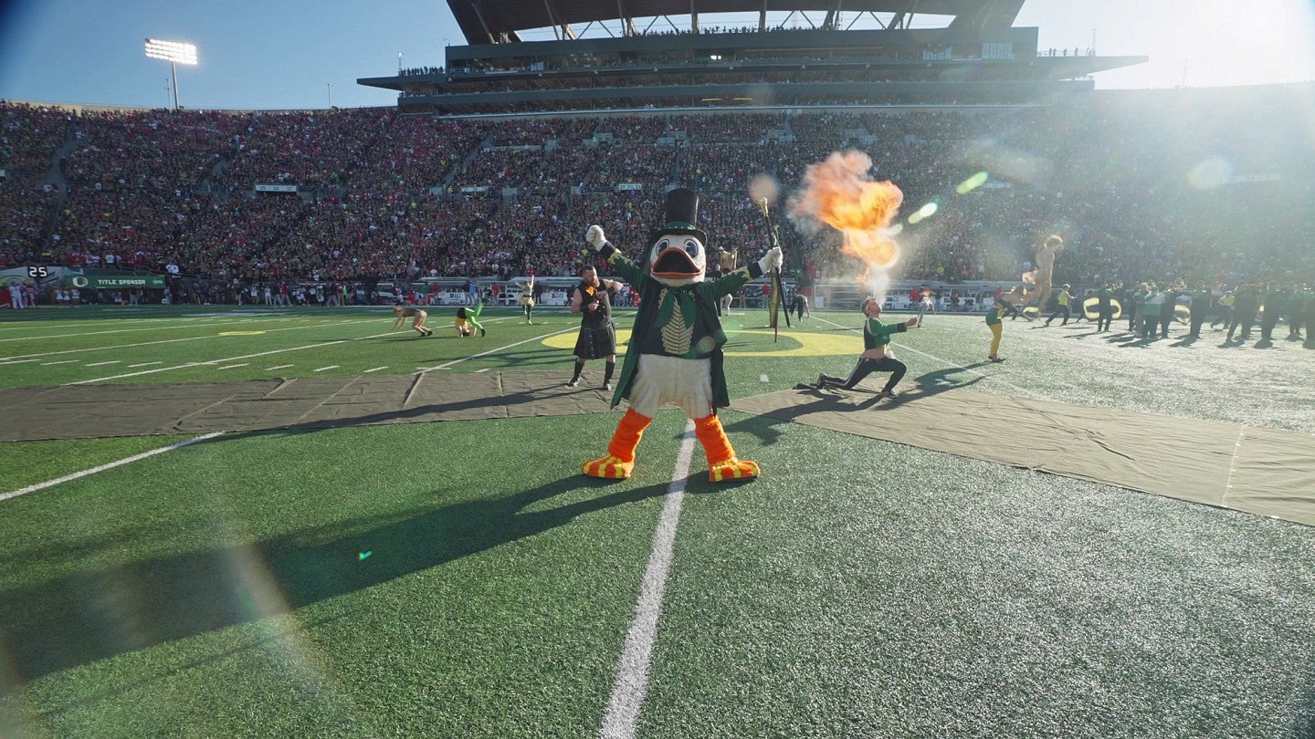The Duck during the Greatest Mascot performance in Autzen Stadium with acrobats and fire breathers