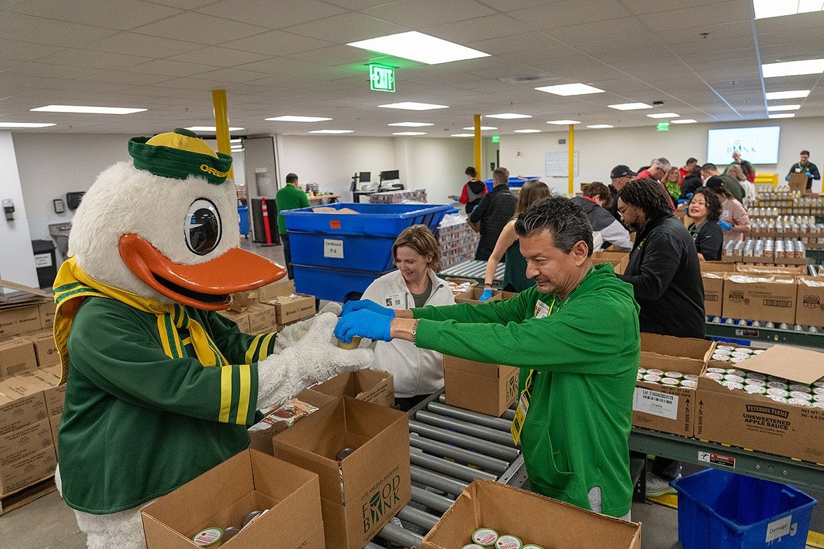 Volunteers packing food boxes at the LA Regional Food Bank.