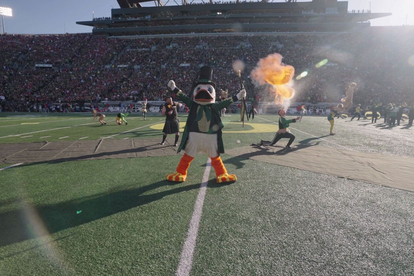 The Duck during the Greatest Mascot performance in Autzen Stadium with acrobats and fire breathers