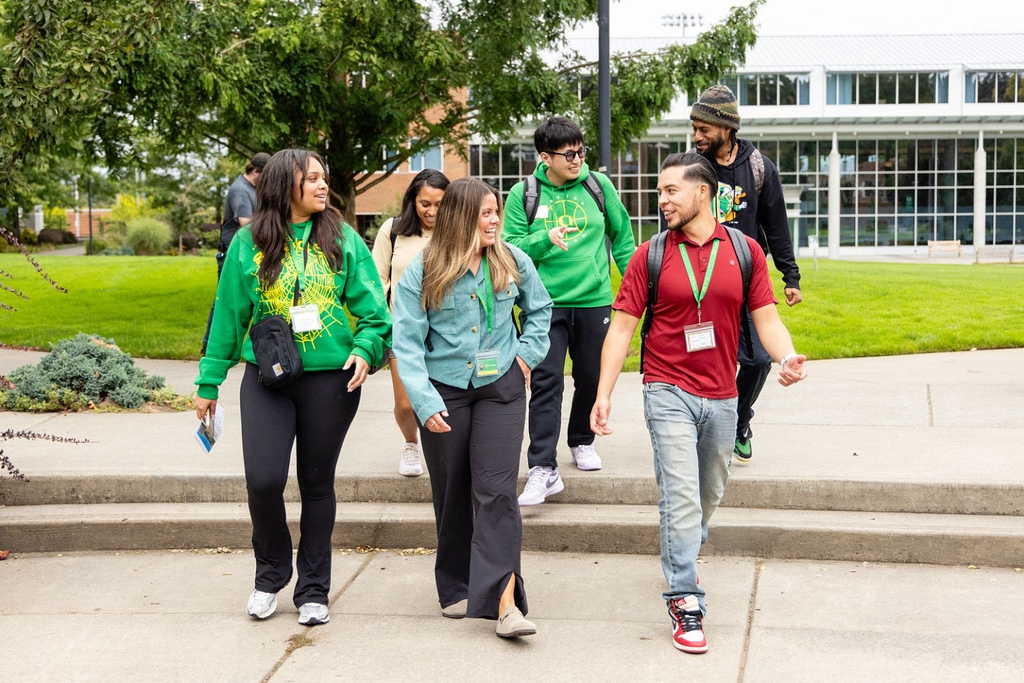 a group of students walking through the UO Portland campus