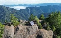 Wildfire camera mounted on a ridge near a fire