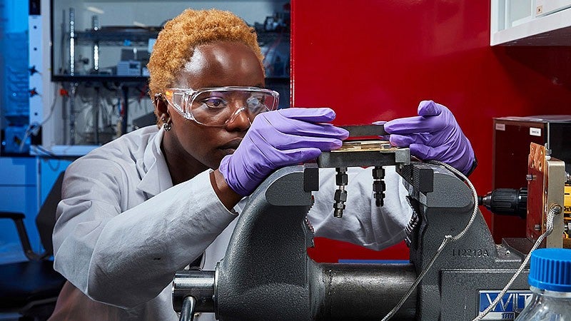 Michell Marufu working in a lab
