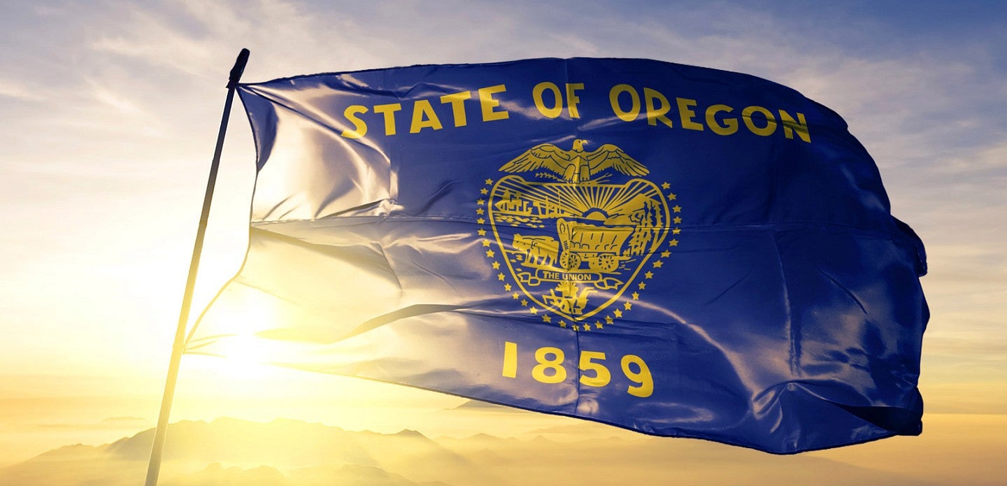 State of Oregon flag blowing in the breeze