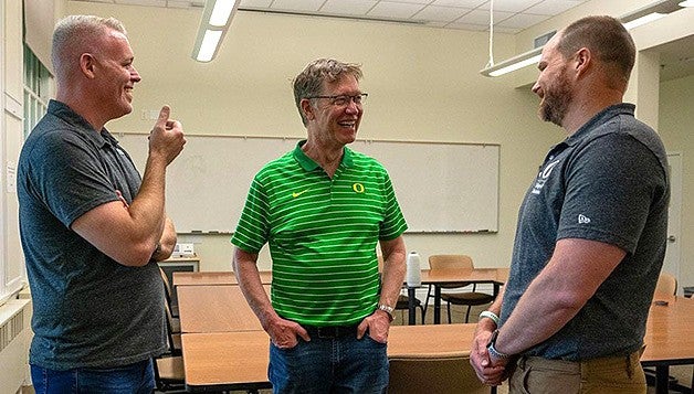 Entrepreneur Bob Mighell (center) chats with PBISApps leaders Robin Spoerl and Kent McIntosh.