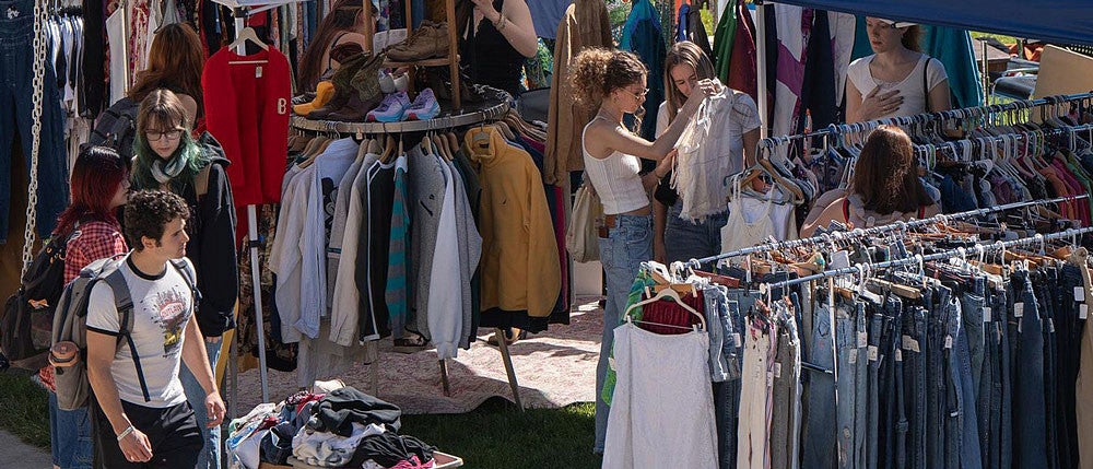 shoppers browse at the UO flea market