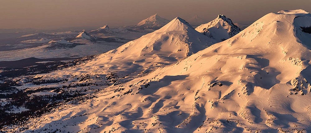 mountain range covered in snow