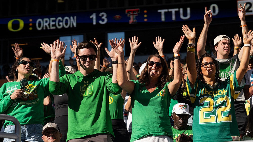 Oregon Duck fans at the Orange Bowl game
