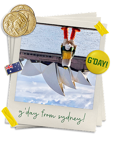 An upside down photo of the Oregon Duck standing in front of the Sydney Opera House in Sydney, Australia.