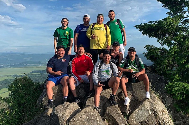 Latinx Male and Allies Alliance group standing on Spencer Butte