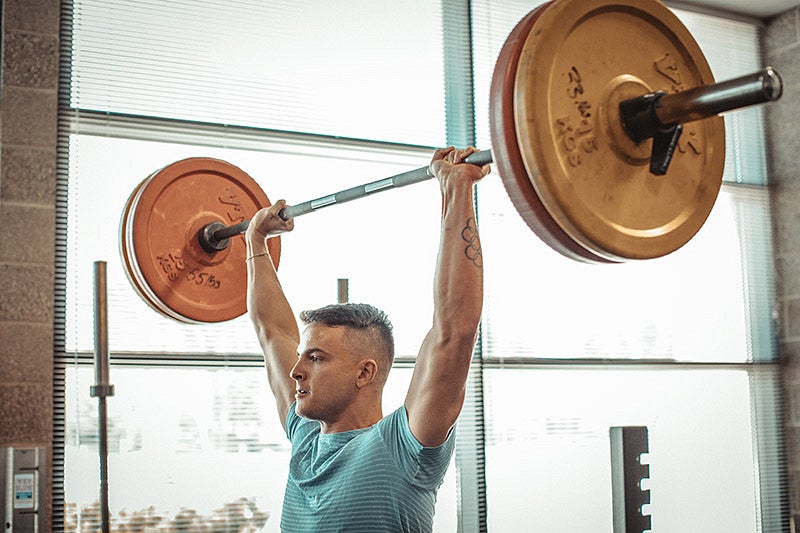 Devon Allen lifting weights