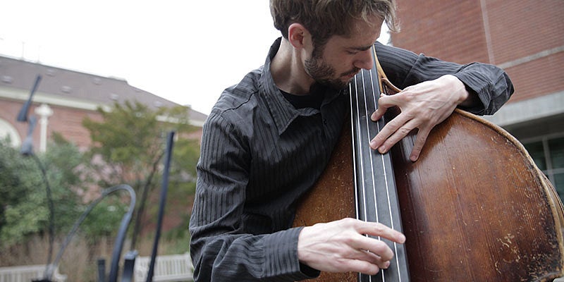 Aaron Nelson playing the bass