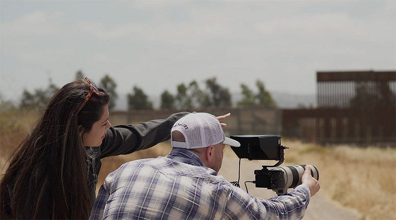 Adam Markle with Jessica Solis filming