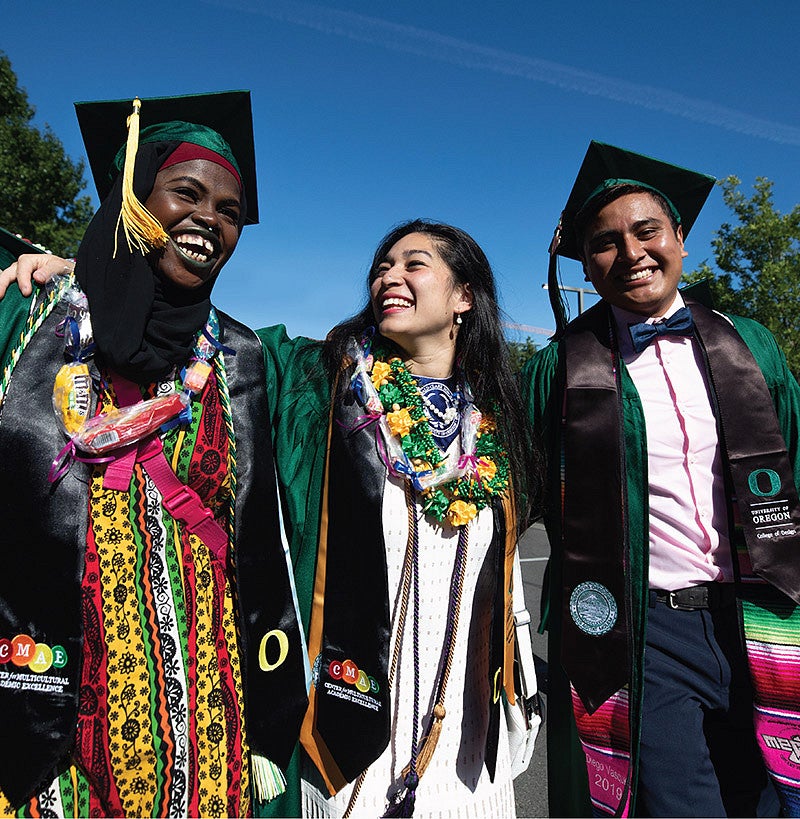 Alumni in graduation caps and gowns