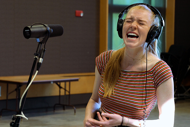 Haley Faringer singing in the soundbooth