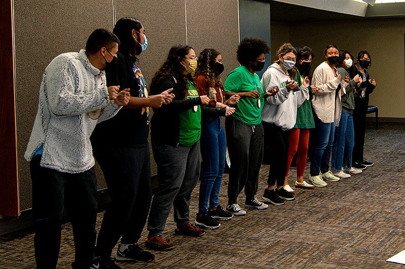 students performing their group introduction