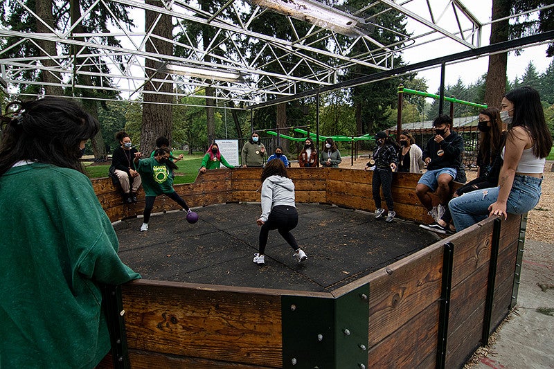 students playing a ball game as a part of team building activities at Camp Harlow