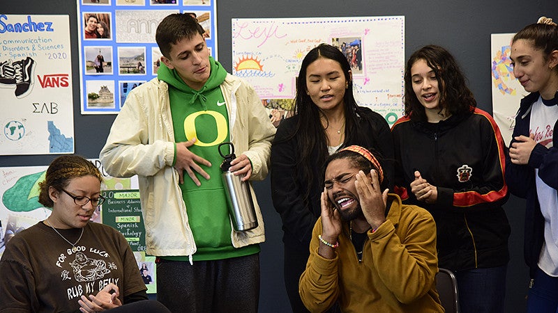 students performing their group introduction during the 2019 New Student Fall Retreat