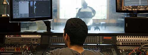 Student in a recording booth