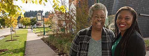 Lyllye Reynolds-Parker and Aris Hall in front of the Black Cultural Center