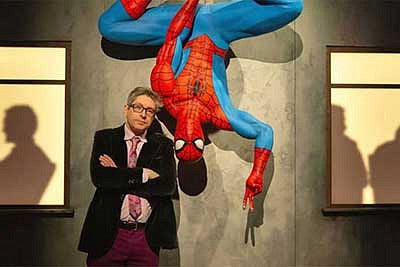 Ben Saunders with Spiderman handing upside down