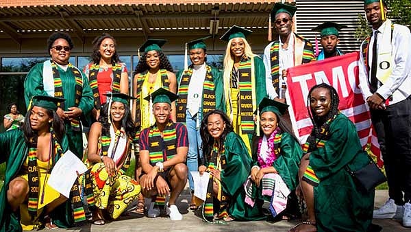 A group of graduates in their caps and gowns