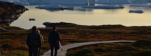 Dave Sutherland, Kristin Schild, and Casey Shoop in front of a glacier