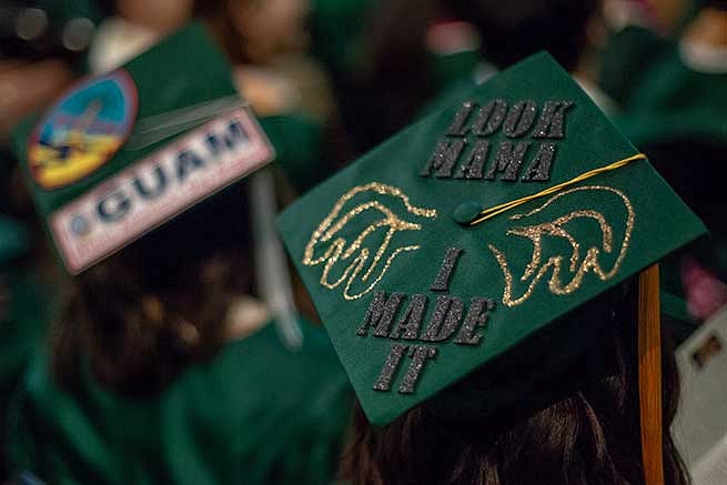 Graduation cap reads: Look mama, I made it. Graduation cap reads: Look mama, I made it.