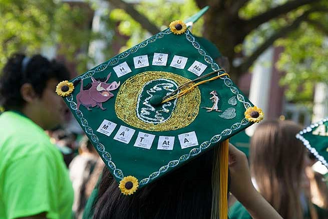 Graduation cap reads: Hakuna Matata. Graduation cap reads: Hakuna Matata.