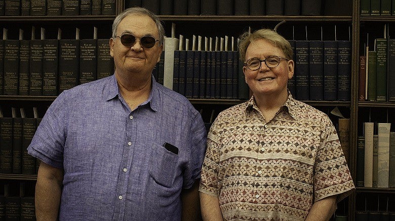 David de Lorenzo, the Giustina Director of Special Collections and Bruce Tabb, Rare Books Curator with UO Libraries