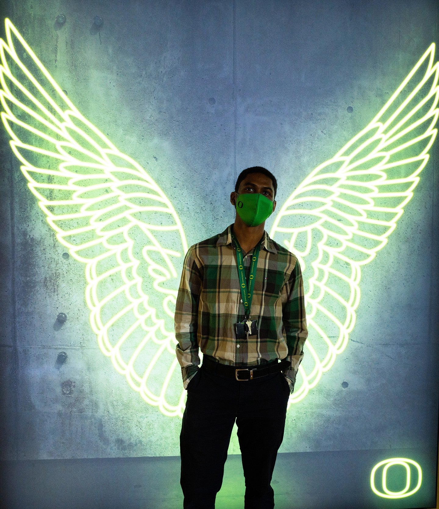 Derek McBride, RA in Unthank Hall, standing by Duck wings in Welcome Center