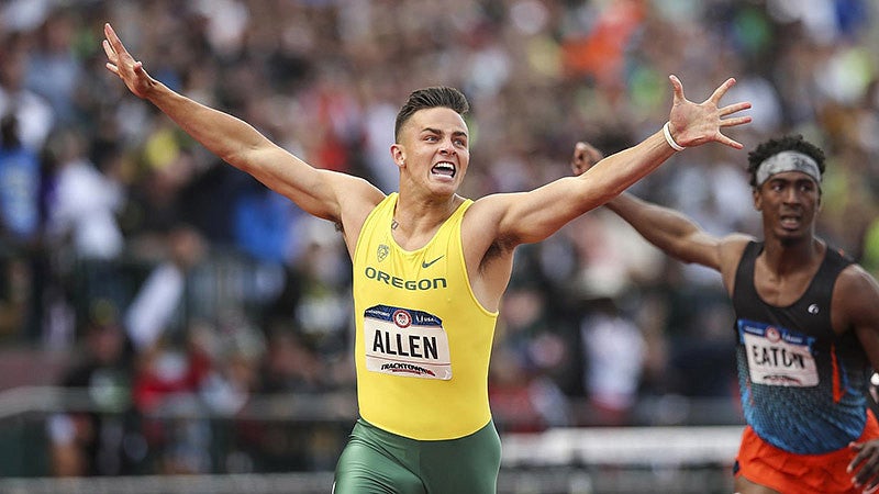 Devon Allen crossing the finish-line of a race