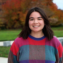 Eloise Navarro with autumn trees