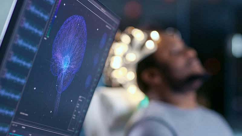 Man wearing brain wave sensor net