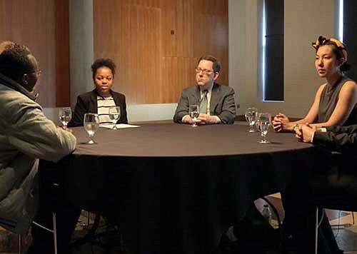 President Michael Schill with students at a Freedom of Expression roundtable discussion