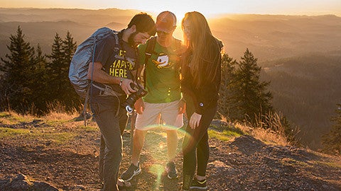 Justin Hartney shooting photos at the top of Spencer Butte